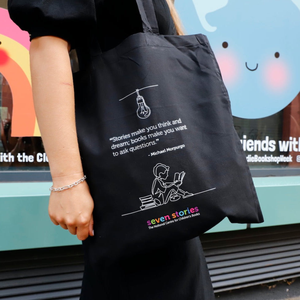'Stories make you think and dream' Tote Bag